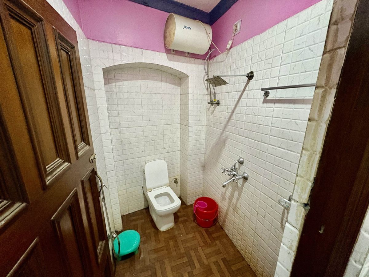 Clean bathroom at New Metro Guest House Kolkata